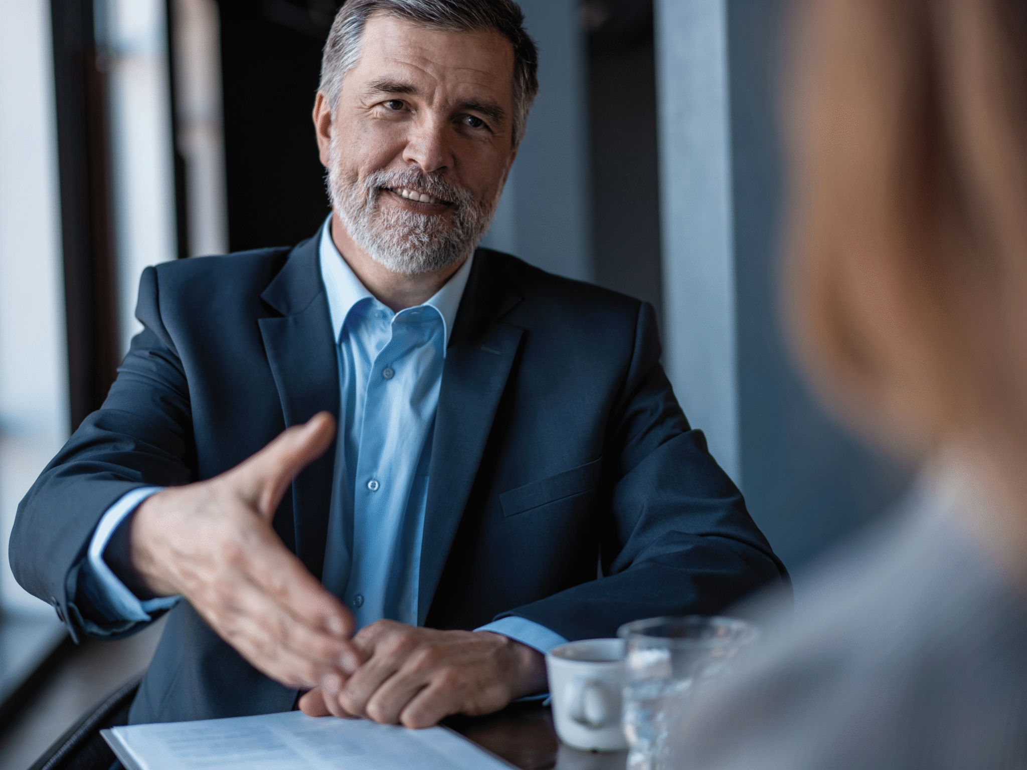 Business Coach im Coachinggespräch - Business Coaching - Executive Coaching - benefitIMPACT